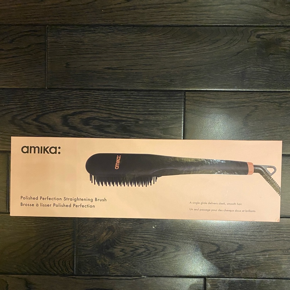 BRAND NEW Amika heated straightening brush.